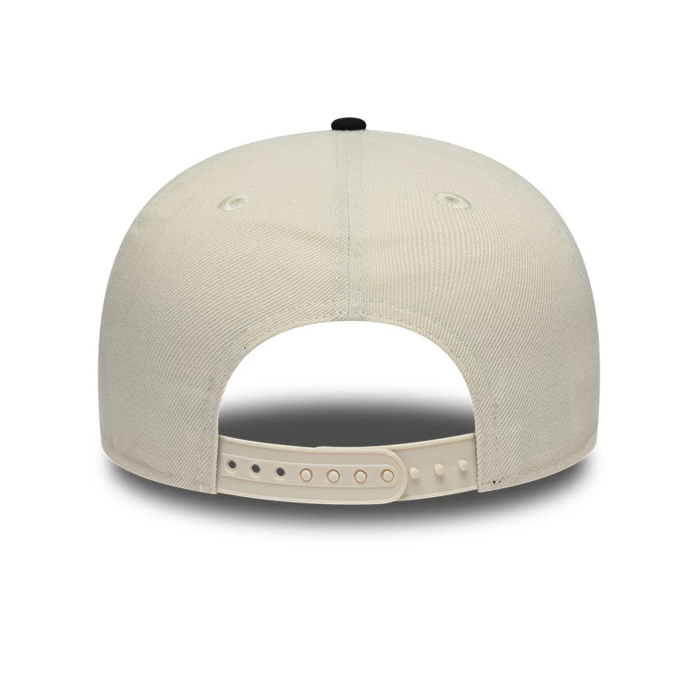 New Era Ombre Script Light Beige & Black 9FIFTY Snapback Adjustable Cap, rear view showing a structured light beige crown with two embroidered eyelets, a black top button, and an adjustable beige snapback closure for custom fit.