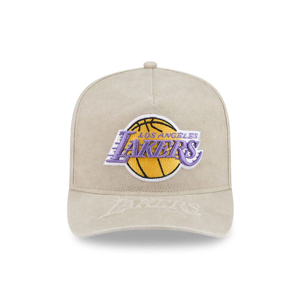 LA Lakers NBA Light Beige New Era 9FIFTY A-Frame Snapback Adjustable Cap, front view showing the large yellow and purple Lakers logo with raised embroidery on the light beige crown, and detailed Los Angeles Lakers text on the curved visor.