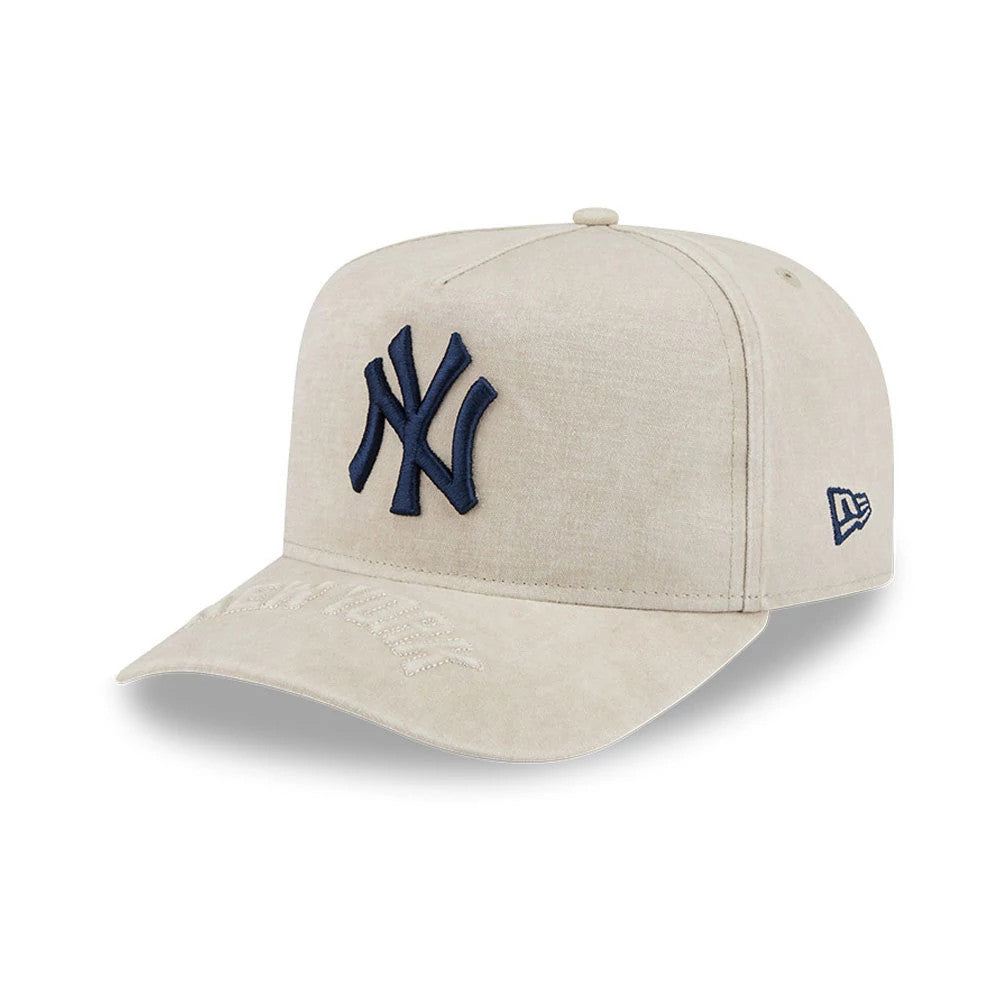 New York Yankees MLB Light Beige New Era 9FIFTY A-Frame Snapback Adjustable Cap, front view showing the navy raised embroidered NY logo on the structured light beige crown, light beige visor with embroidery, and New Era flag logo on the left side.