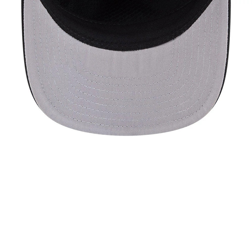 Chicago White Sox MLB Evergreen Black New Era 19TWENTY Adjustable Cap, underside view showing the light grey undervisor with detailed stitching, part of the black sewn edge of the visor, and the bottom of the structured black crown.