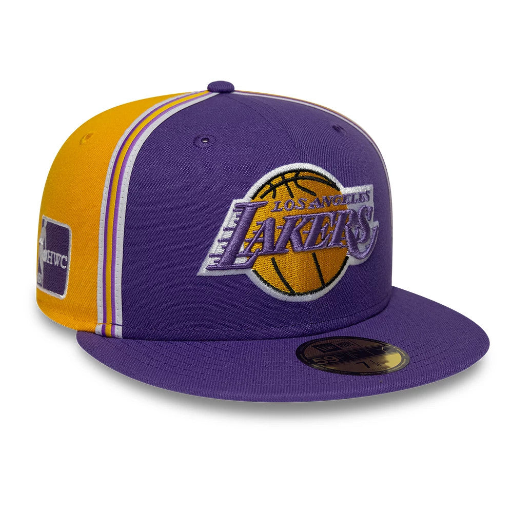 LA Lakers NBA Hardwood Classic Players Purple New Era 59FIFTY Fitted Cap, front view showing the raised purple and yellow embroidered Lakers logo on the front panel, purple visor with gold 59FIFTY size sticker, and the HWC logo on the left side.