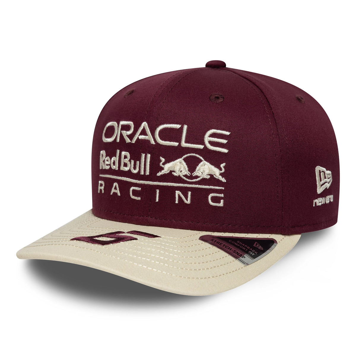 Red Bull Racing Austin Race Special Isack Hadjar Burgundy New Era 9SEVENTY Stretch Snap Cap, front view showing the white Red Bull Racing logo in raised embroidery on the structured burgundy crown, with a beige visor featuring a burgundy graphic.