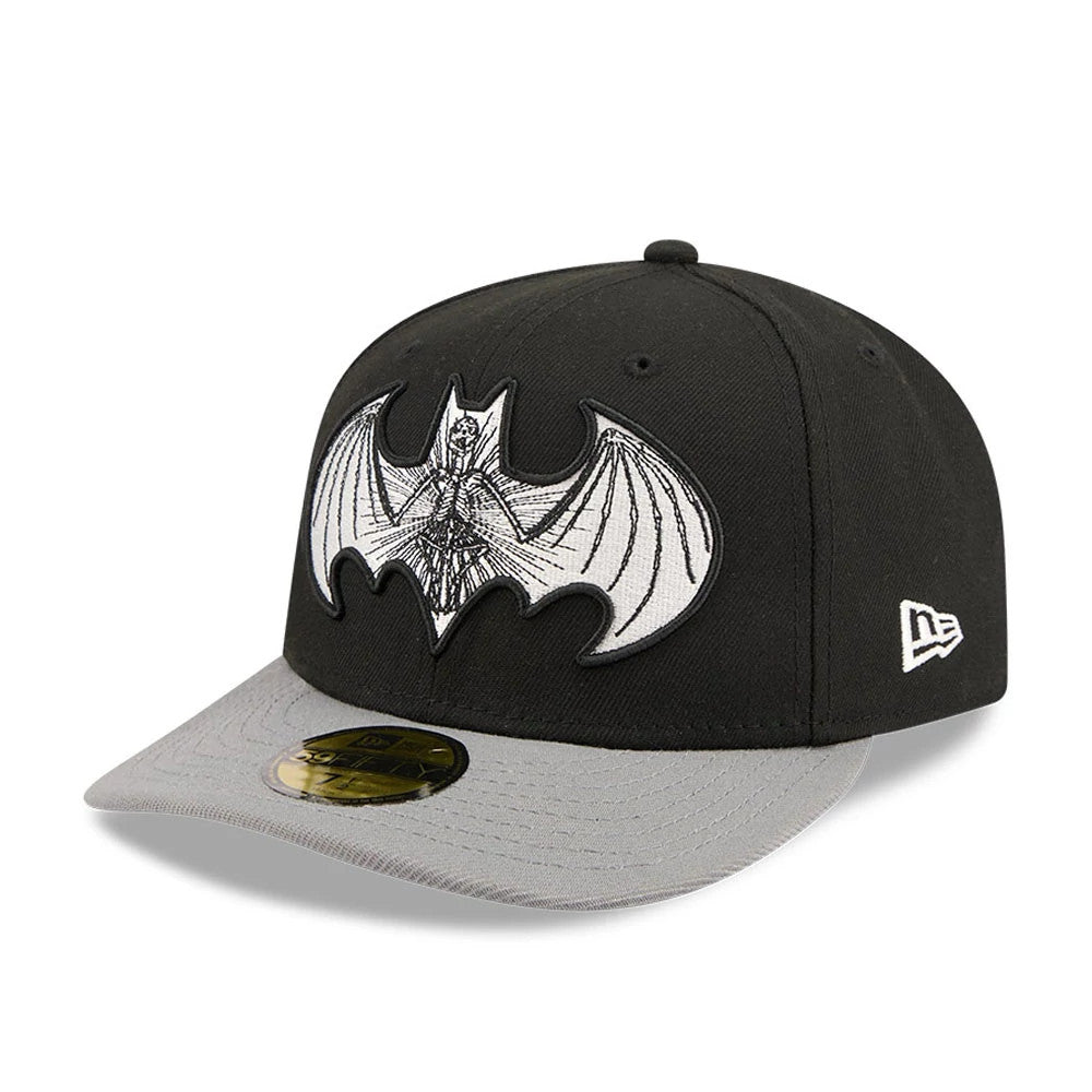 DC Batman Black New Era 59FIFTY Fitted Cap, three-quarter view showing a large, detailed white and black Batman logo embroidered on the front panels, a contrasting grey flat visor with a gold 59FIFTY size sticker.