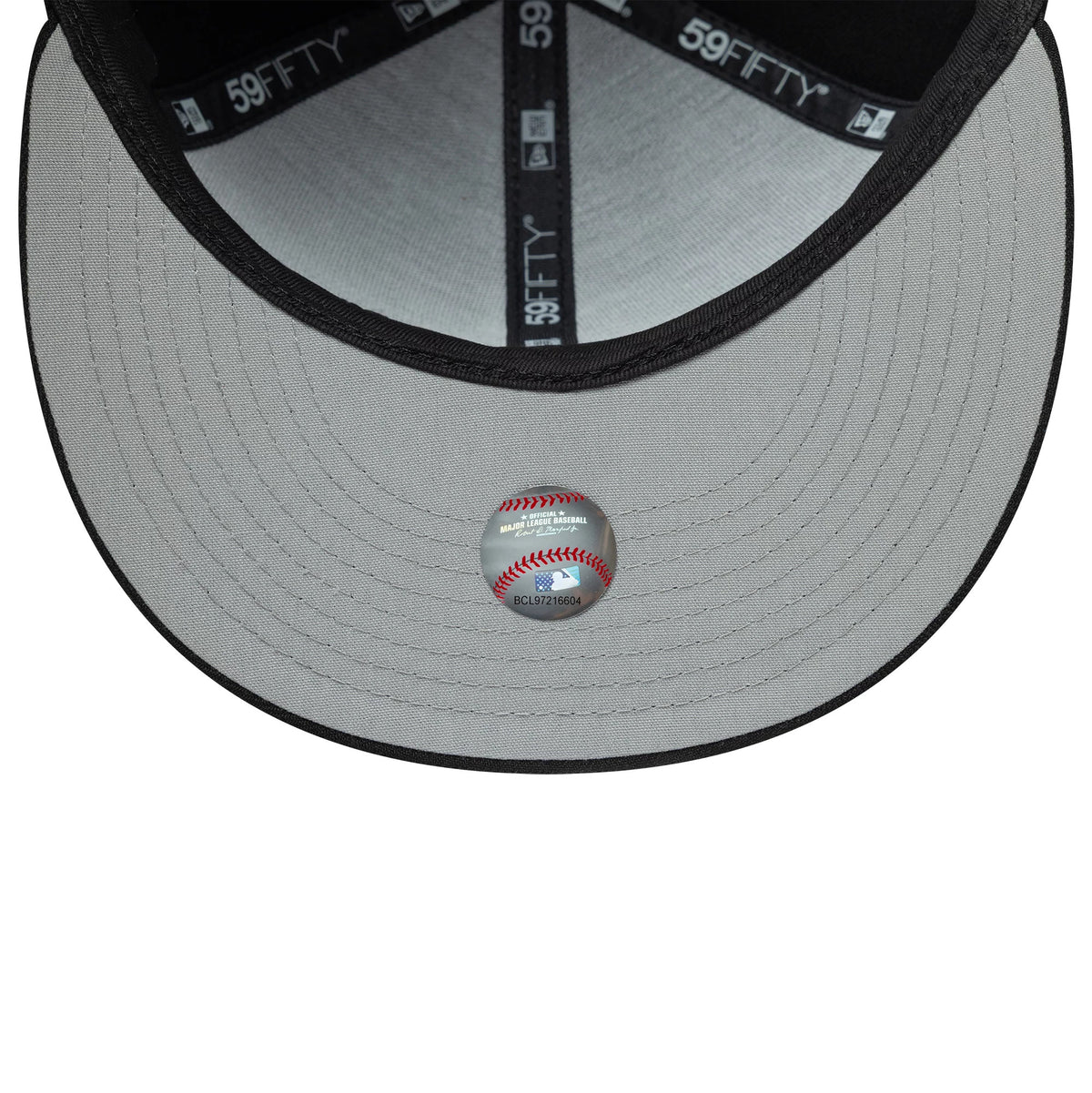 LA Dodgers MLB Bats Black New Era 59FIFTY Fitted Cap, inside view showing the grey undervisor with MLB hologram sticker centred near the edge, black taping with repeated 59FIFTY branding, and structured interior crown lining in black.