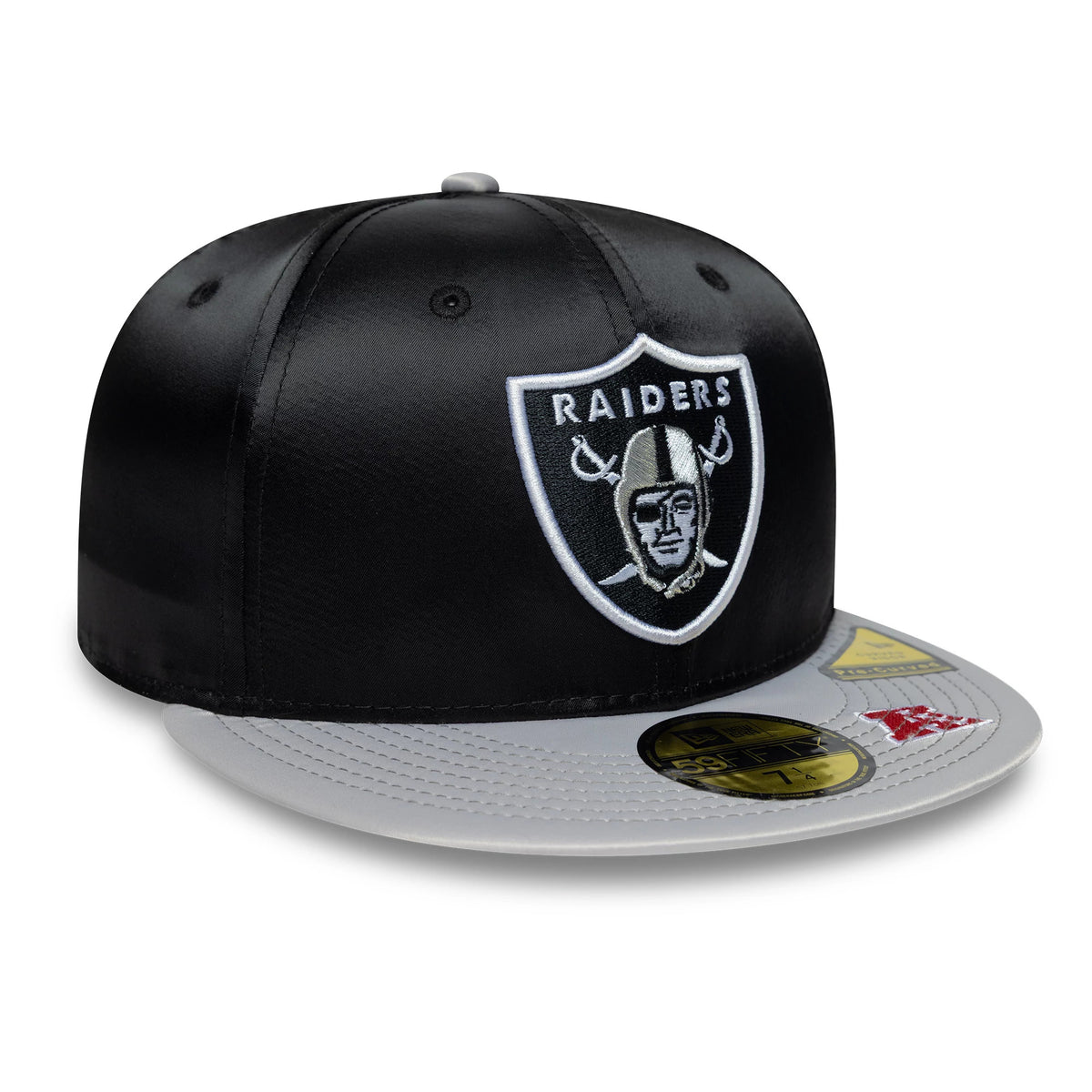 LA Raiders NFL Satin Black & Grey New Era 59FIFTY Fitted Cap, front view showing a raised embroidered Raiders logo on the black structured crown, a flat grey visor with gold 59FIFTY size sticker, and detailed visor stitching.