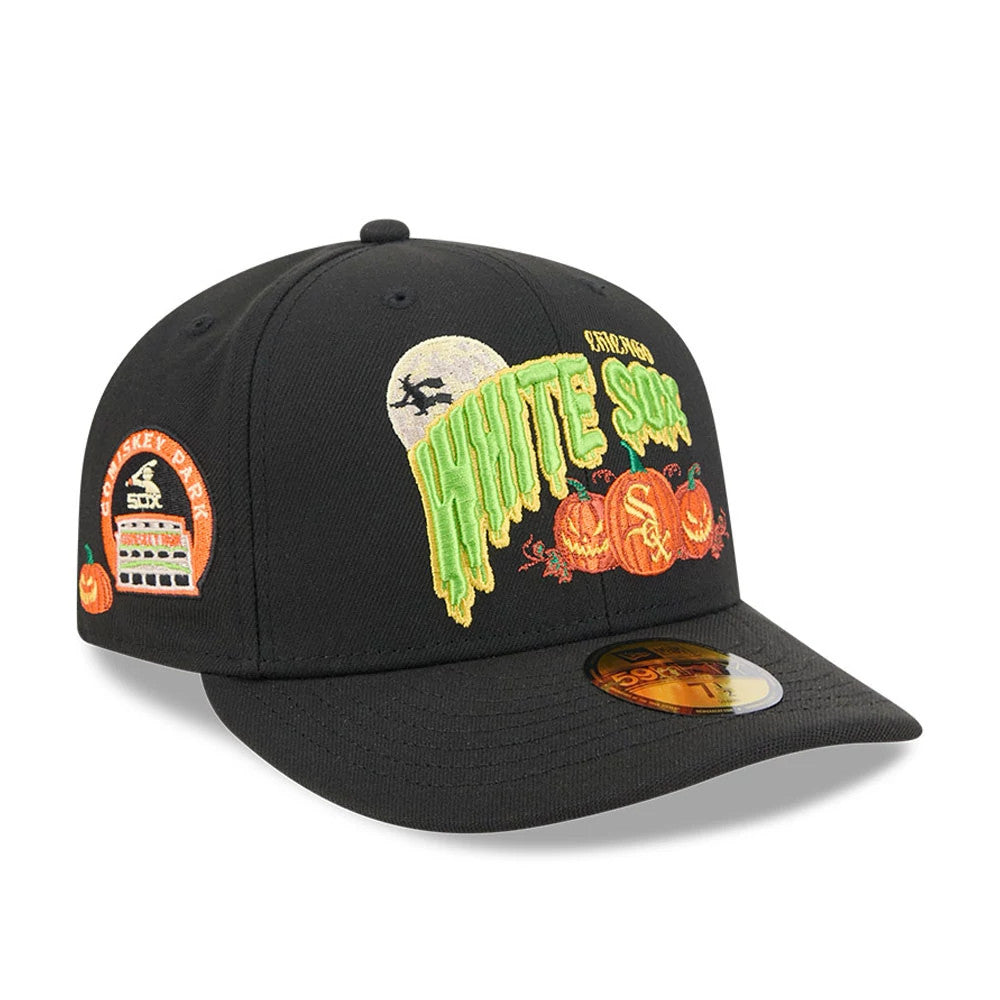 Chicago White Sox MLB Pumpkin Patch Black New Era 59FIFTY Fitted Cap, three-quarter view showing a green raised embroidered team logo with pumpkins and a moon on the front panels, a Comiskey Park graphic on the right side.