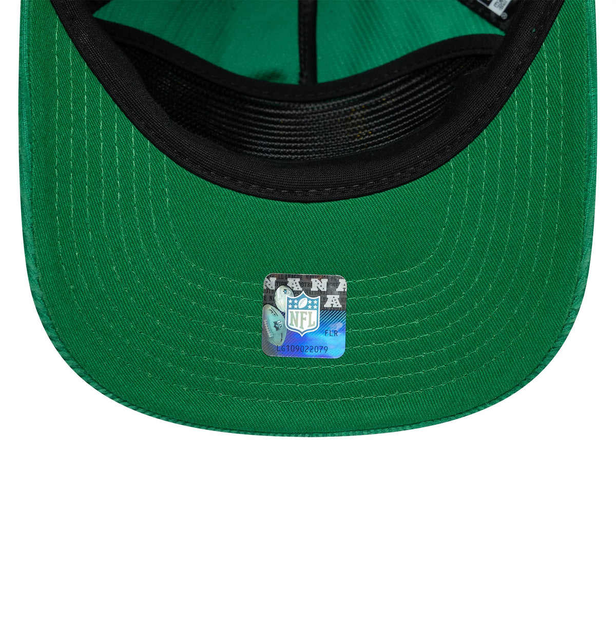Athletics MLB Retro Dynasty Cord Green New Era 19TWENTY Adjustable Cap, inside view showing the green undervisor with an NFL holographic sticker centred on it and a black sweatband, complemented by black taping along the seams.