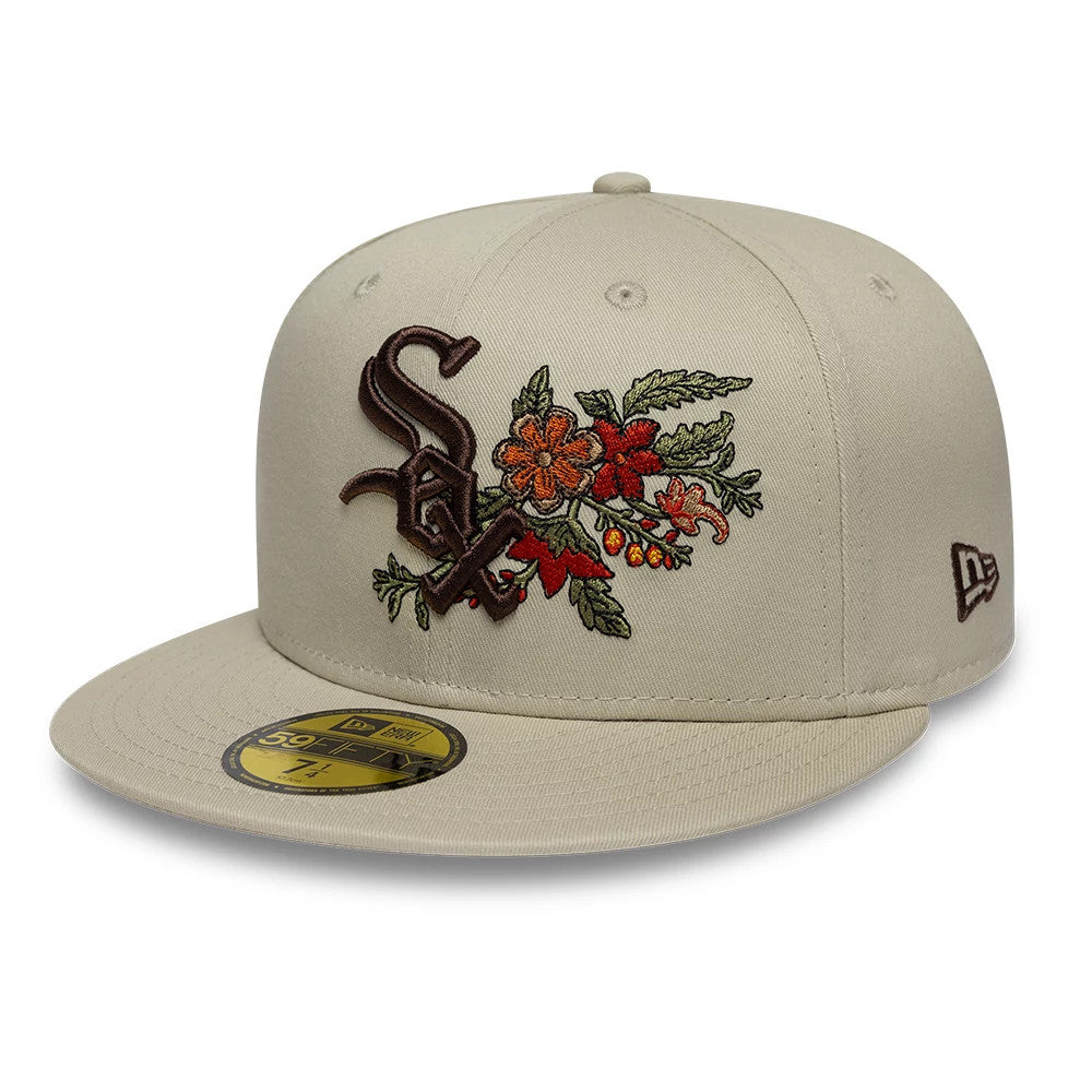 Chicago White Sox MLB Floral Light Beige New Era 59FIFTY Fitted Cap, front view showing the dark brown raised embroidered team logo intertwined with red and orange floral designs on the structured beige crown.