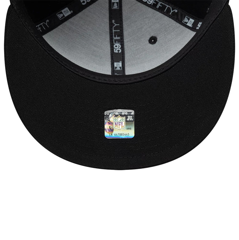 Las Vegas Raiders NFL Floral Black New Era 59FIFTY Fitted Cap, inside view showing the grey undervisor with black taping featuring 59FIFTY branding, a black sweatband, and an NFL sticker centrally placed on the black visor.