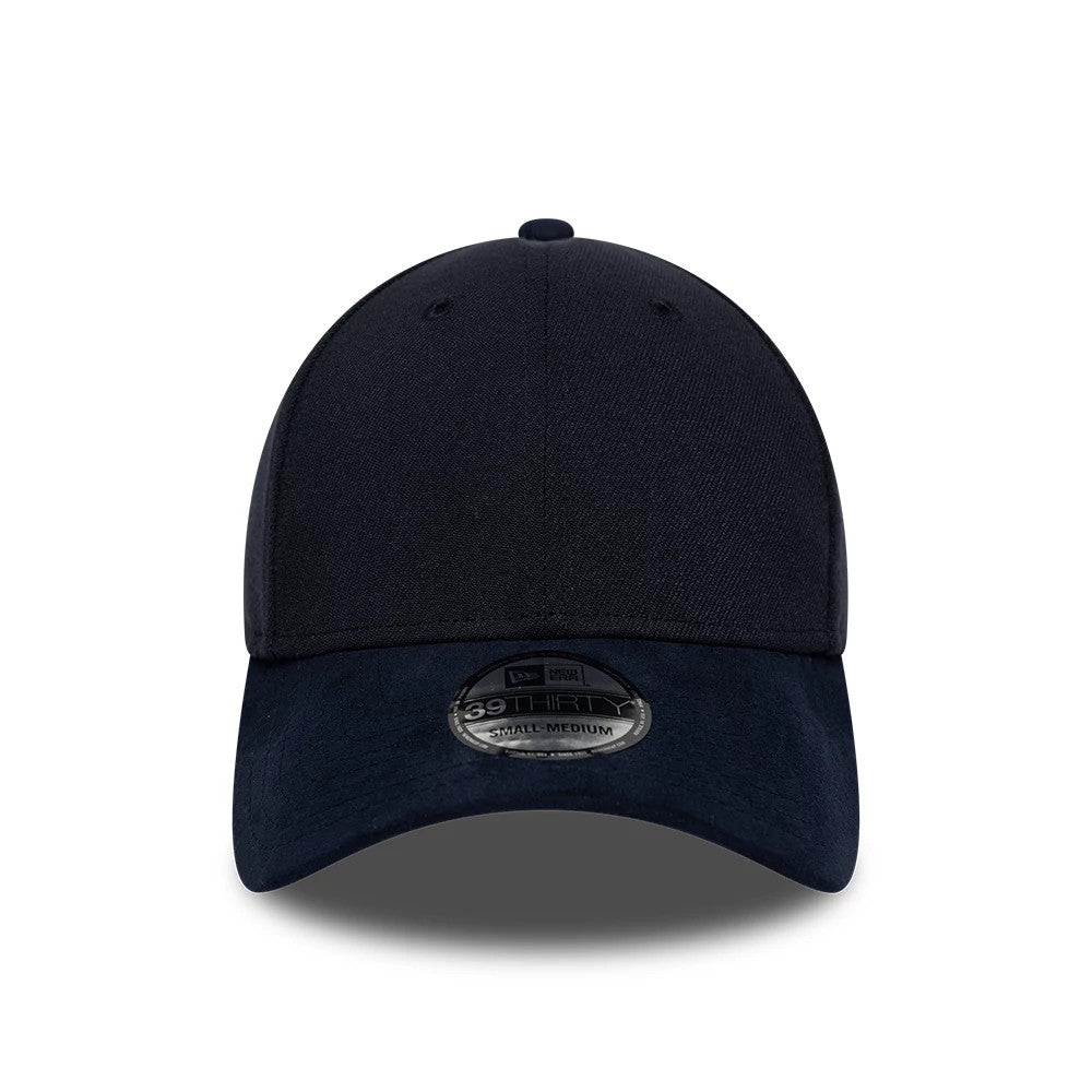 New Era Suede Visor Navy 39THIRTY Stretch Fit Cap, front view showing the black embroidered New Era flag logo on the left side of the structured navy crown, with a suede-textured visor featuring a 39THIRTY size sticker at the centre.