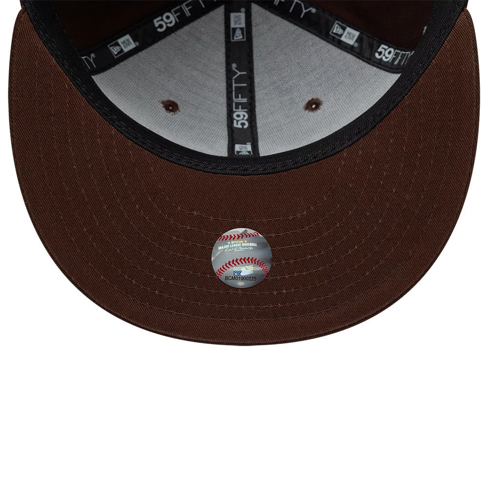 New York Yankees MLB Floral Dark Brown New Era 59FIFTY Fitted Cap, inside view showing the grey fabric panels with black 59FIFTY taping, brown undervisor with a baseball sticker, and black sweatband detail.