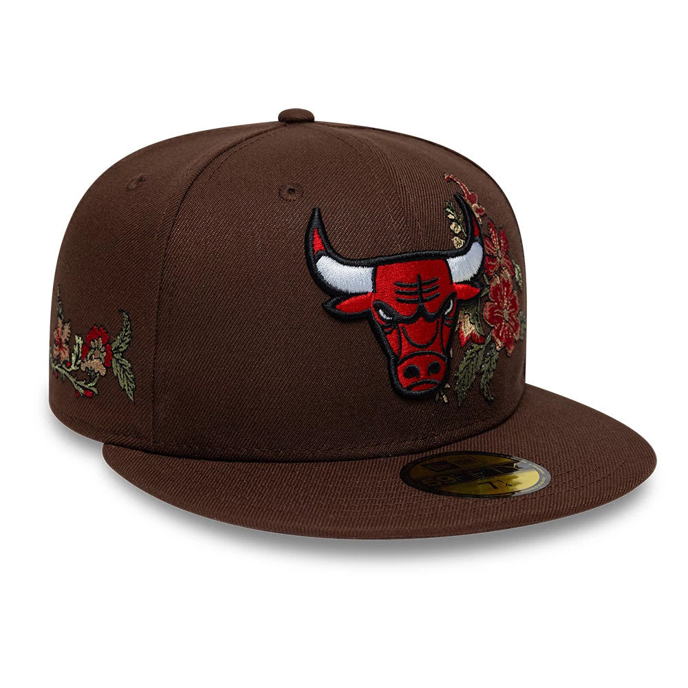 Chicago Bulls NBA Floral Dark Brown New Era 59FIFTY Fitted Cap, front view showing the red and black embroidered Bulls logo on the structured brown crown, floral embroidery on the side panel, and a gold 59FIFTY size sticker on the flat visor.