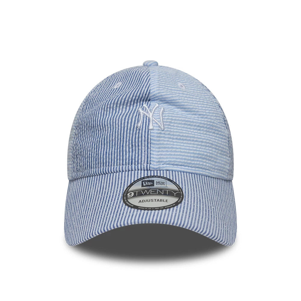 New York Yankees MLB Stripe Pastel Blue New Era 9TWENTY Adjustable Cap, front view showing the white embroidered NY logo on the front panel, curved visor with a 9TWENTY size sticker, and a soft blue and white striped pattern.