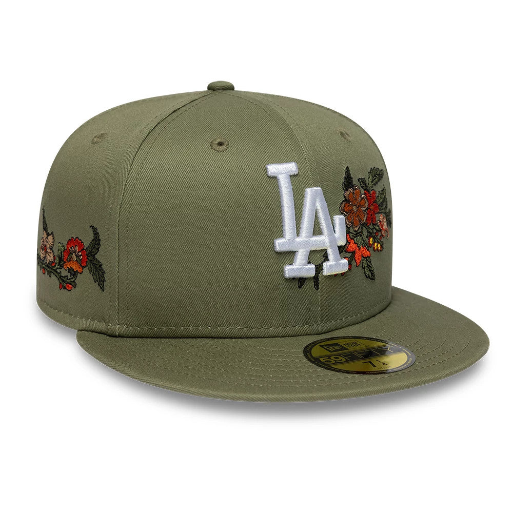 LA Dodgers MLB Floral Dark Green New Era 59FIFTY Fitted Cap, front view showing a raised white embroidered LA logo on the structured dark green crown, detailed floral embroidery on both sides, and a gold 59FIFTY size sticker on the flat visor.