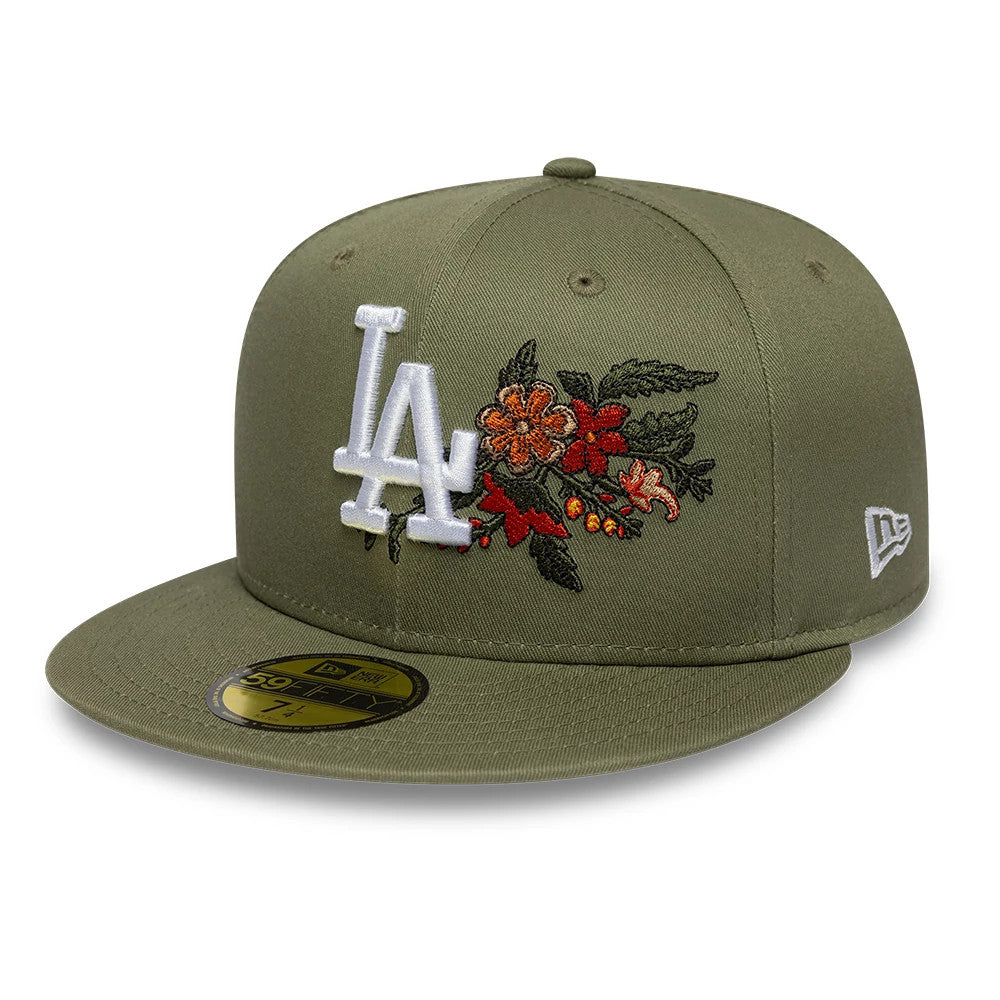 LA Dodgers MLB Floral Dark Green New Era 59FIFTY Fitted Cap, front view showing the white LA logo in raised embroidery beside intricate floral designs in red and orange, with a gold 59FIFTY size sticker on the flat dark green visor.