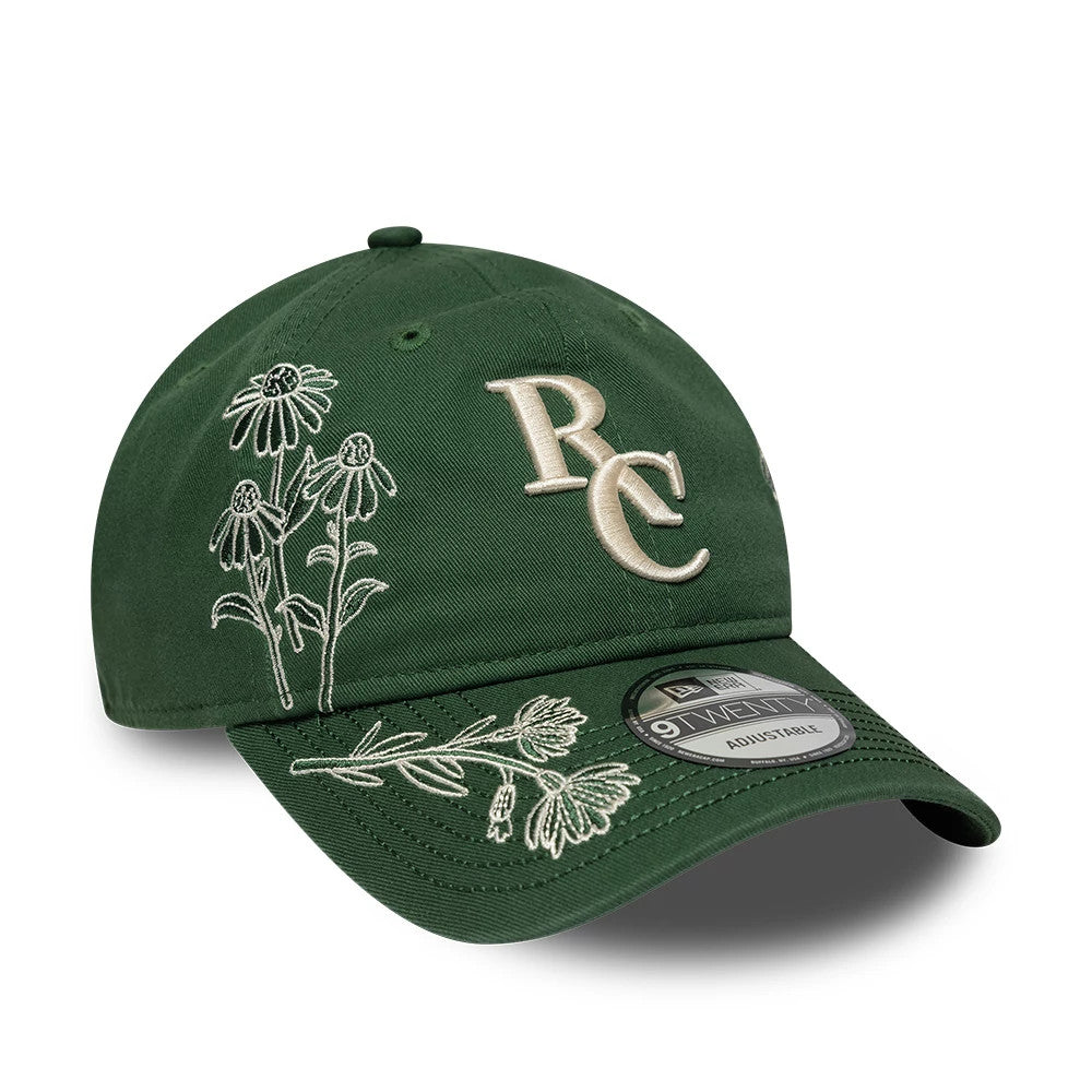 Ryder Cup 2027 All Over Print Dark Green New Era 9TWENTY Adjustable Cap, front view showing an embroidered beige RC logo on the front panel, detailed white floral embroidery on the crown and visor.