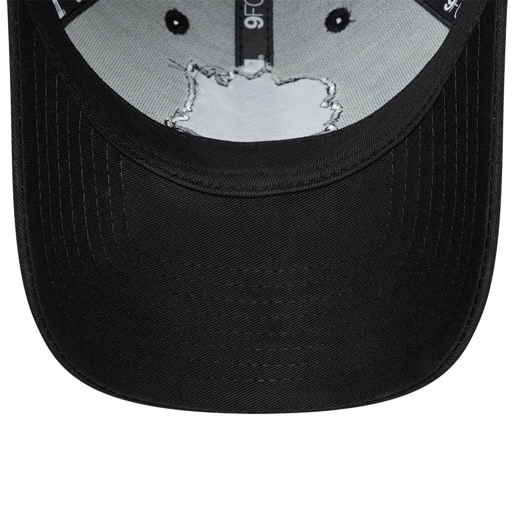 Godzilla X TGR Haas F1 Black New Era 9FORTY Adjustable Cap, inside view showing a grey undervisor, black interior taping with 9FORTY branding, and the inner stitching of the crown with eyelet reinforcements.