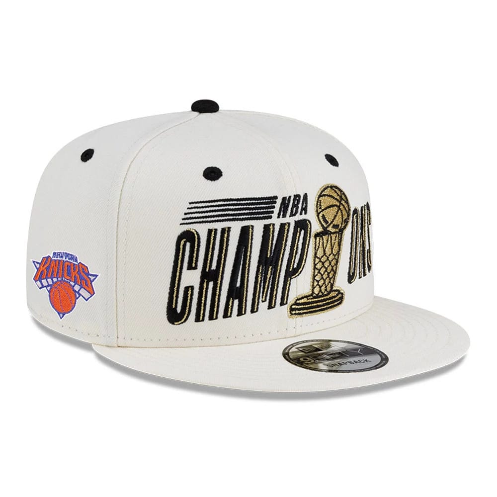Pictured is this NBA Finals Parade 2026 New York Knicks 9FIFTY Snapback cap in white. 1