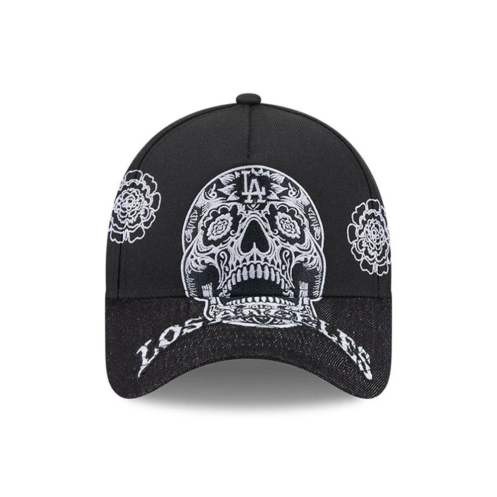 LA Dodgers MLB Day Of The Dead Black New Era 9FORTY A-Frame Adjustable Cap, front view showing intricate white embroidered skull design with LA logo on the crown, floral patterns on the side panels, and Los Angeles script on the visor.