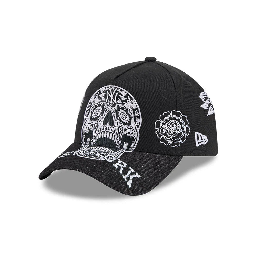 New York Yankees MLB Day Of The Dead Black New Era 9FORTY A-Frame Adjustable Cap, three-quarter view showing white skull and flower embroidery on the structured black crown, New Era flag logo on the left side.