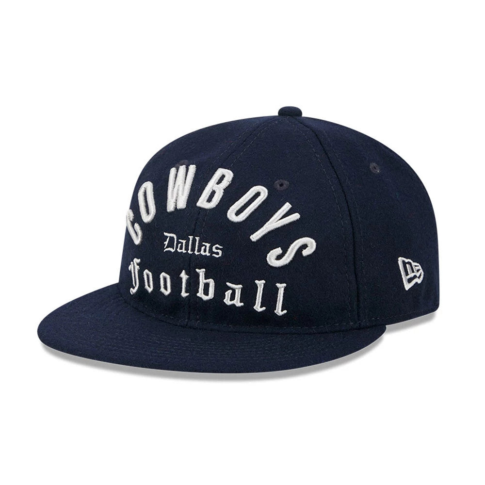 Dallas Cowboys NFL Historic Arch Dark Blue Retro Crown New Era 59FIFTY Fitted Cap, three-quarter view showing white raised embroidery of Cowboys and Football on the front panels, with a blue flat visor and New Era flag logo on the left side.