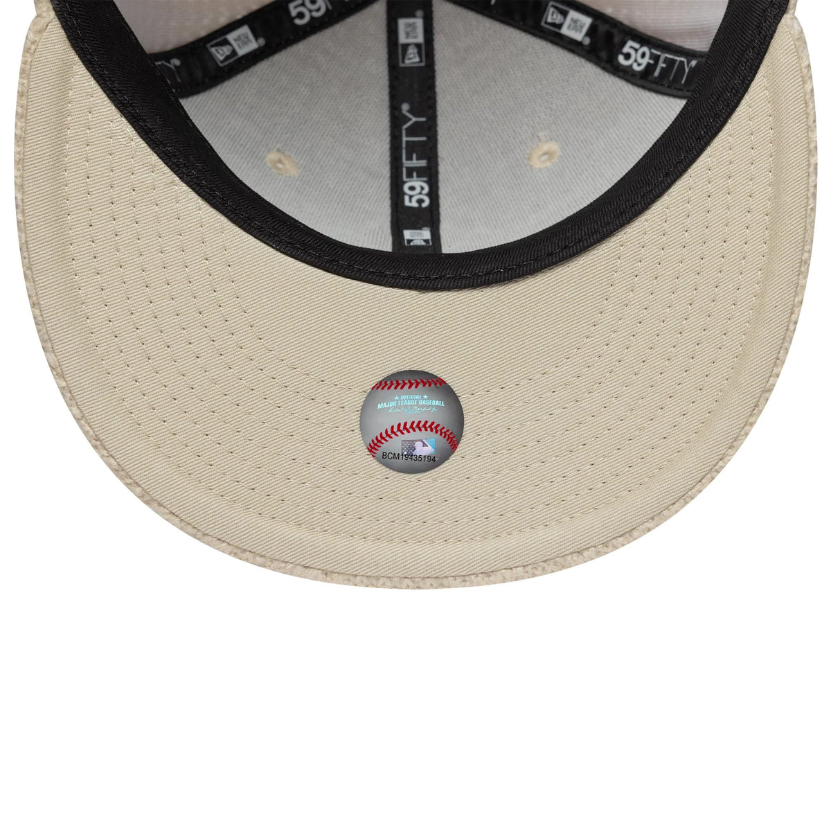 Pictured is this MLB Knitted New York Yankees 59FIFTY Fitted cap in light beige. 7