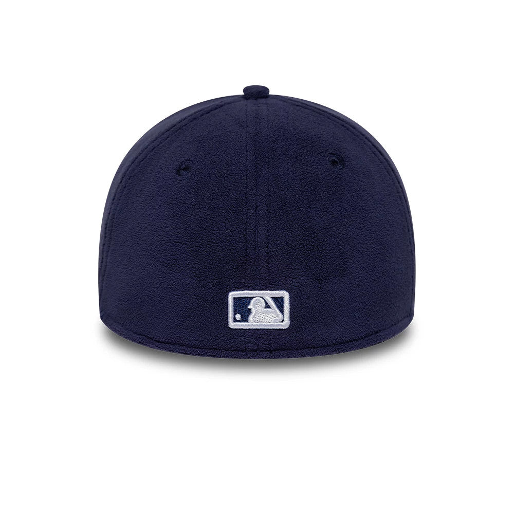 LA Dodgers MLB Fleece Navy New Era 39THIRTY Stretch Fit Cap, rear view showing the white embroidered MLB Batterman logo centred on the back panels, with a structured navy fleece crown and matching eyelets symmetrically placed.