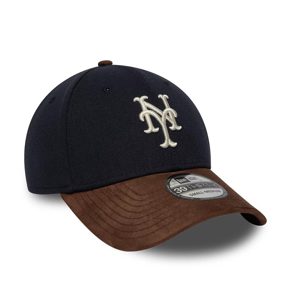 New York Mets MLB Faux Suede Navy & Brown New Era 39THIRTY Stretch Fit Cap, three-quarter view showing the white embroidered NY logo on the structured navy crown, brown faux suede curved visor, and 39THIRTY size sticker on the upper side.