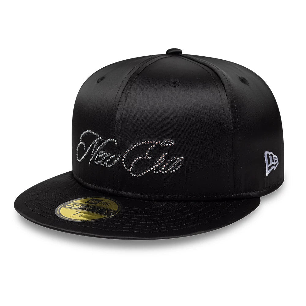 New Era Satin Diamante Black 59FIFTY Fitted Cap, front view showing the New Era script logo in rhinestones across the front panel, a black visor with a gold 59FIFTY size sticker, and the New Era flag logo on the left side.