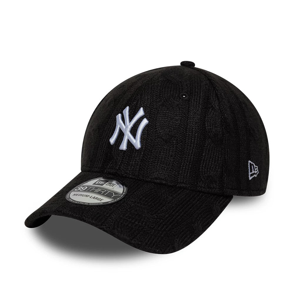 Pictured is this MLB Knitted New York Yankees 39THIRTY Stretch Fit cap in black. 1