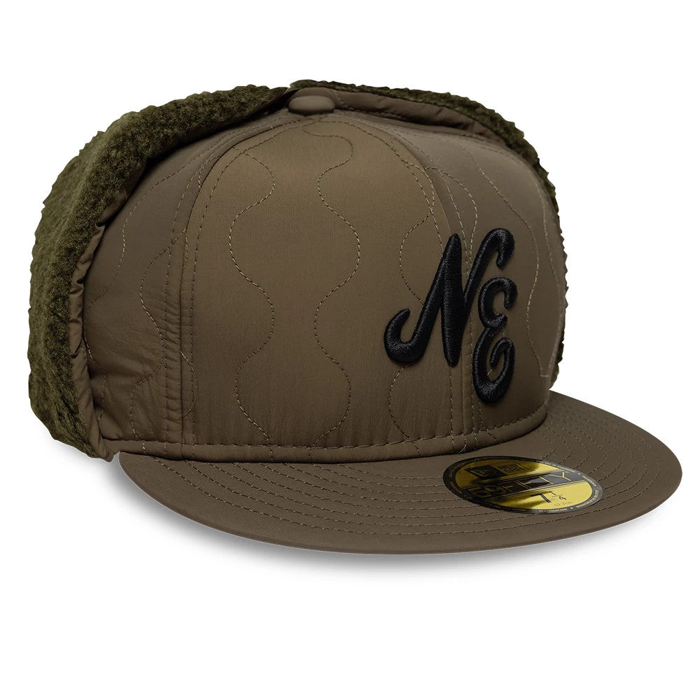 New Era Quilted Dark Green Dogear 59FIFTY Fitted Cap, three-quarter view showing raised black NE embroidery on the front panel, quilted stitching across the crown, and the 59FIFTY size sticker on the flat dark green visor.