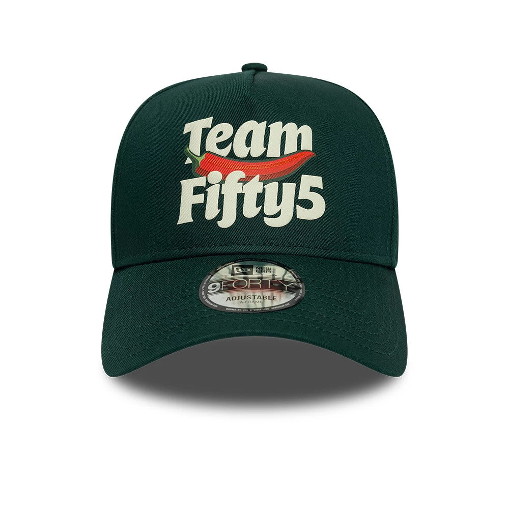 Carlos Sainz Team Fifty5 Puff Print Dark Green New Era 9FORTY A-Frame Adjustable Cap, front view showing a raised Team Fifty5 logo with a red chilli graphic on the structured crown, with a 9FORTY size sticker on the curved visor.