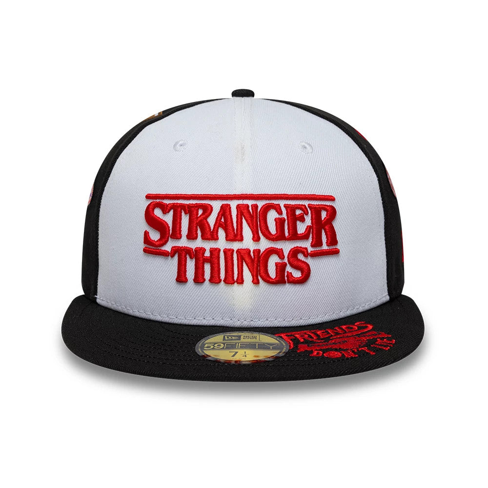 Netflix Stranger Things 10 Years Black New Era 59FIFTY Fitted Cap, front view showing the red embroidered Stranger Things logo centred on the structured white front panel, with a flat black visor featuring a 59FIFTY size sticker.