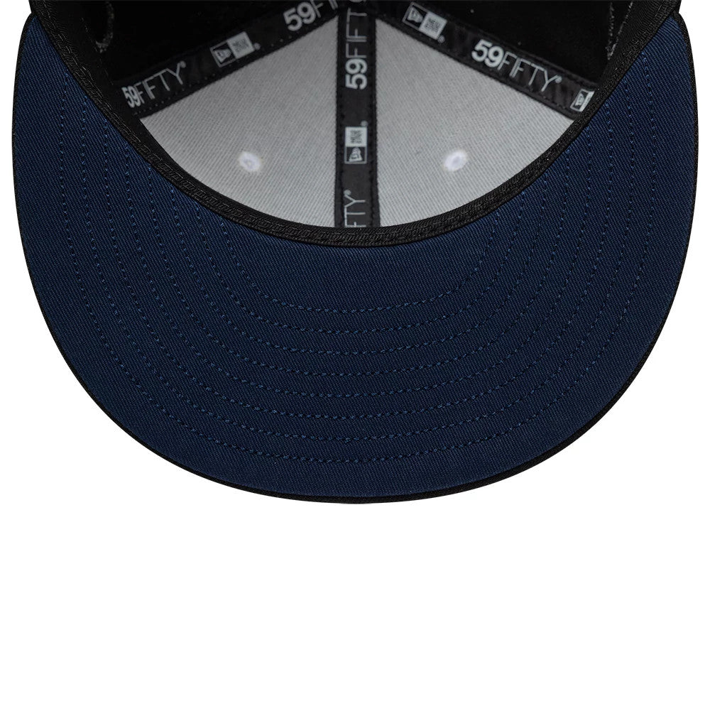 Netflix Stranger Things 10 Years Black New Era 59FIFTY Fitted Cap, inside view showing the black 59FIFTY taping, a navy undervisor, and a grey sweatband with a neat finish on the stitching across the inner seams.