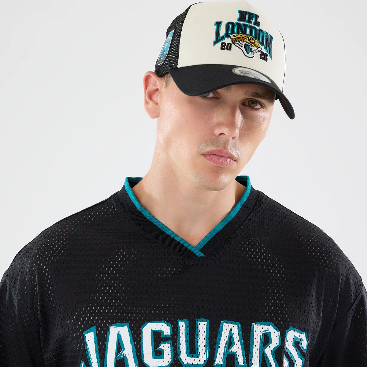 The model is wearing this NFL International Games 2026 Graphic Jacksonville Jaguars Mesh Jersey in black. 4