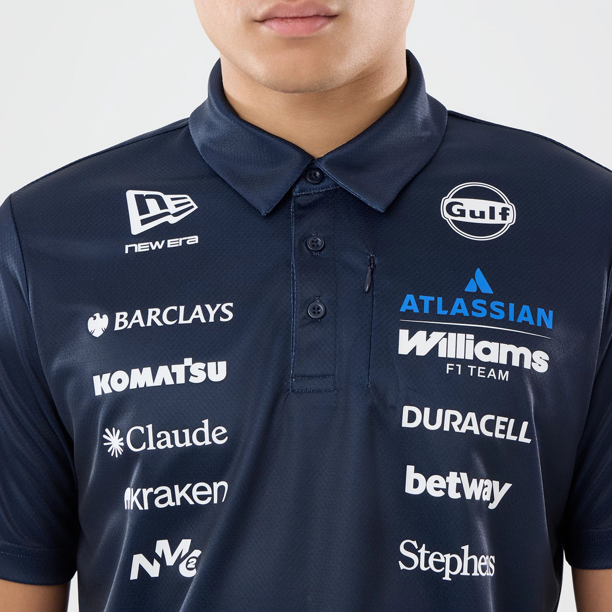New Era Williams Singapore Navy Tech Polo T-Shirt, front view showing the buttoned placket below the folded collar, an embroidered New Era logo on the left shoulder, and multiple sponsor logos, including Gulf, Barclays, and Williams F1 Team.