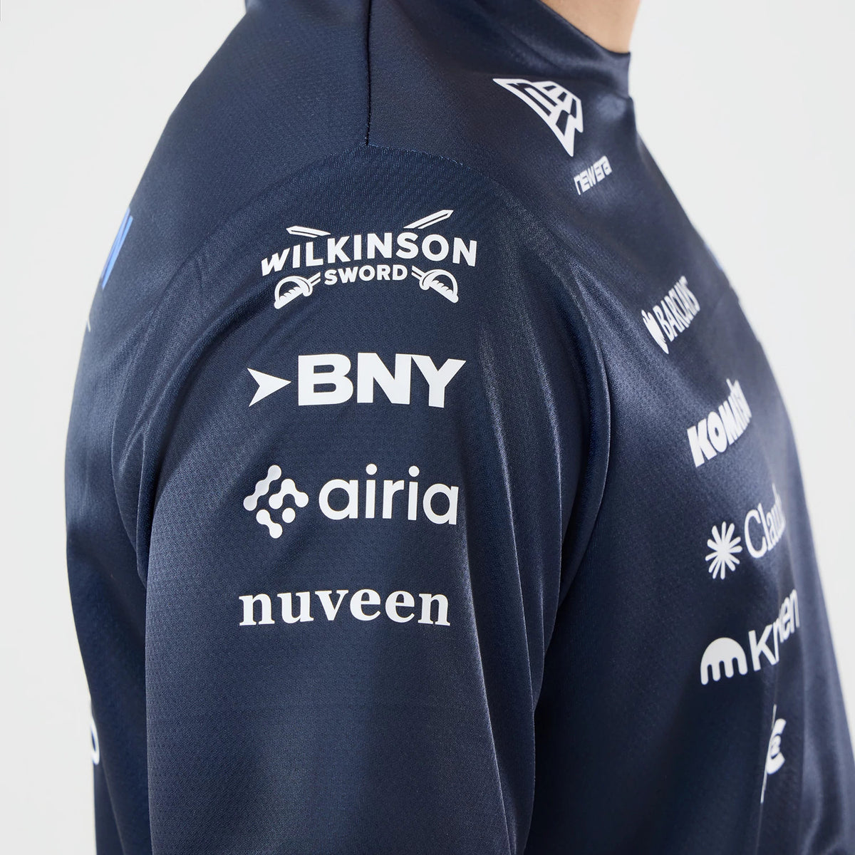 The model is wearing this Singapore Williams Tech T-Shirt in navy. 4