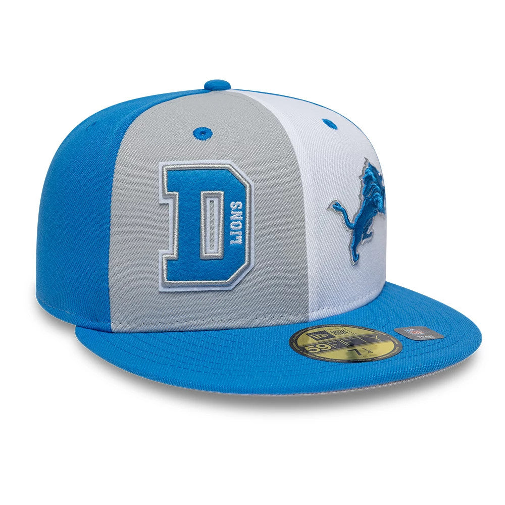 Detroit Lions NFL International Games Blue New Era 59FIFTY Fitted Cap, front view showing raised embroidery of the team logo in blue on the right panel, a large D Lions logo on the left panel, and a blue flat visor with a gold 59FIFTY size sticker.