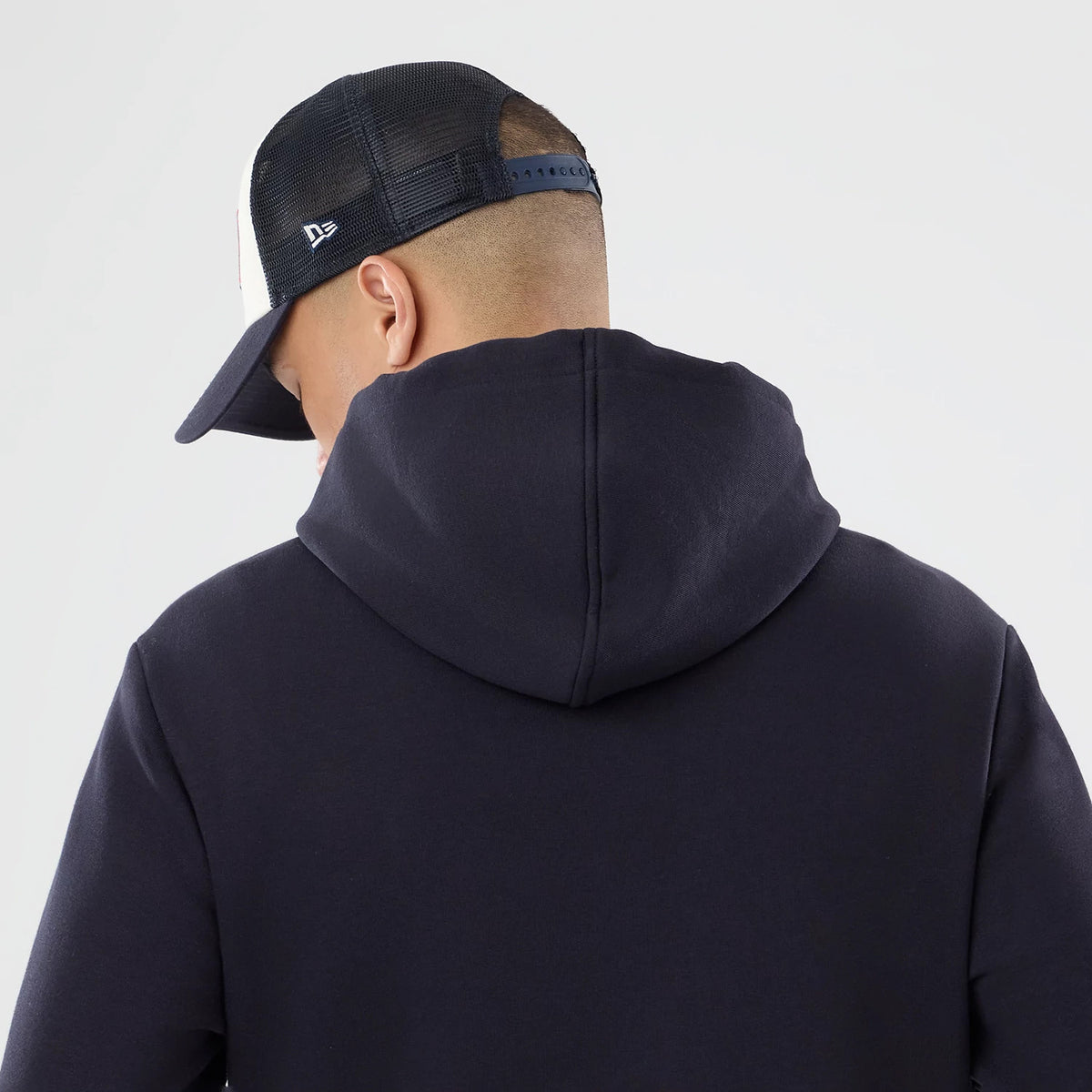 The model is wearing this NFL International Games 2026 Houston Texans Pullover Hoodie in navy. 7