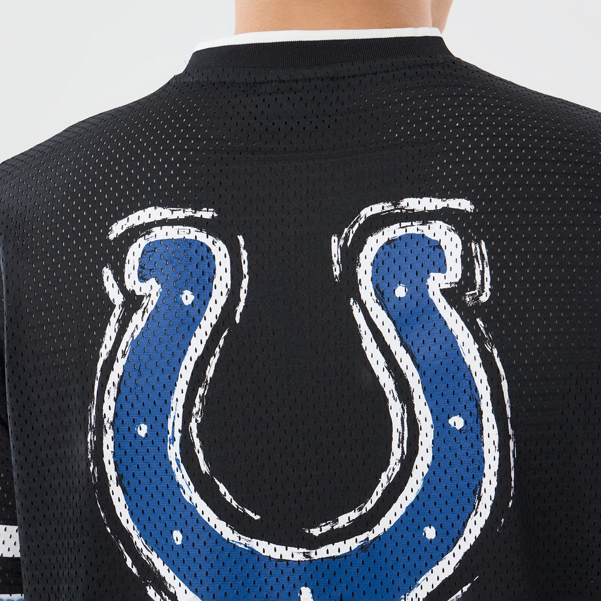 The model is wearing this NFL International Games 2026 Indianapolis Colts Mesh Jersey in black. 7