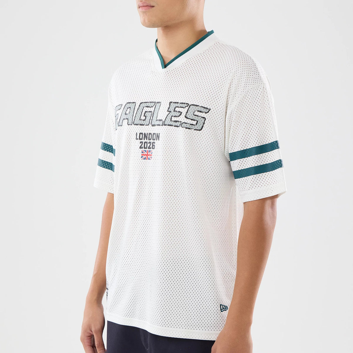 The model is wearing this NFL International Games 2026 Philadelphia Eagles Mesh Jersey in white. 3