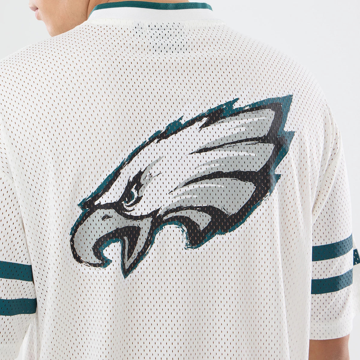 The model is wearing this NFL International Games 2026 Philadelphia Eagles Mesh Jersey in white. 7