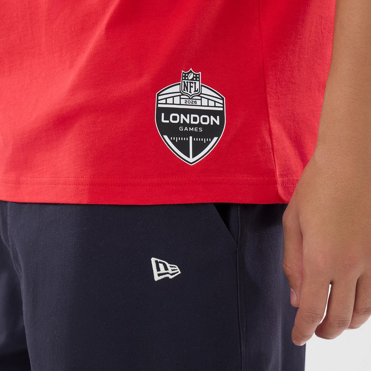 The model is wearing this NFL International Games 2026 Houston Texans Oversized T-Shirt in red. 7