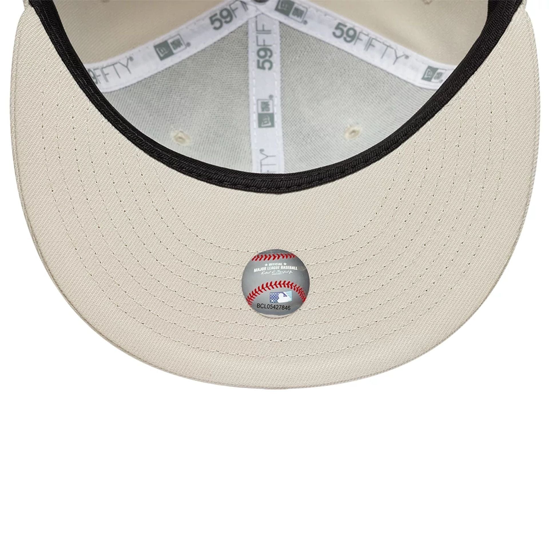 Pictured is this MLB New York Yankees 59FIFTY Fitted cap in beige. 2