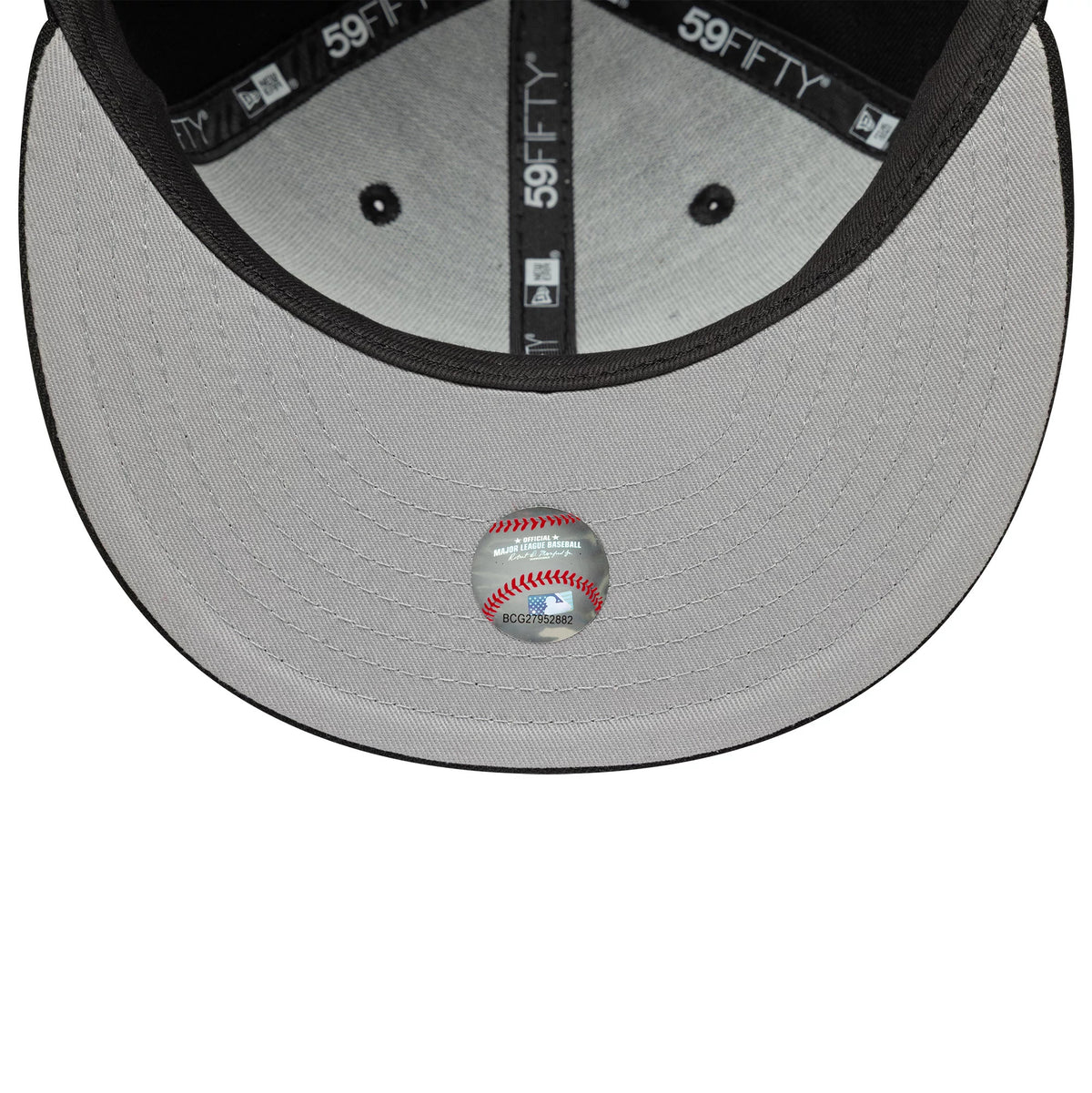 Baltimore Orioles MLB Black New Era 59FIFTY Fitted Cap, inside view showing the grey undervisor with a commemorative baseball sticker, black New Era branded taping, and contrasting black and grey interior panels.