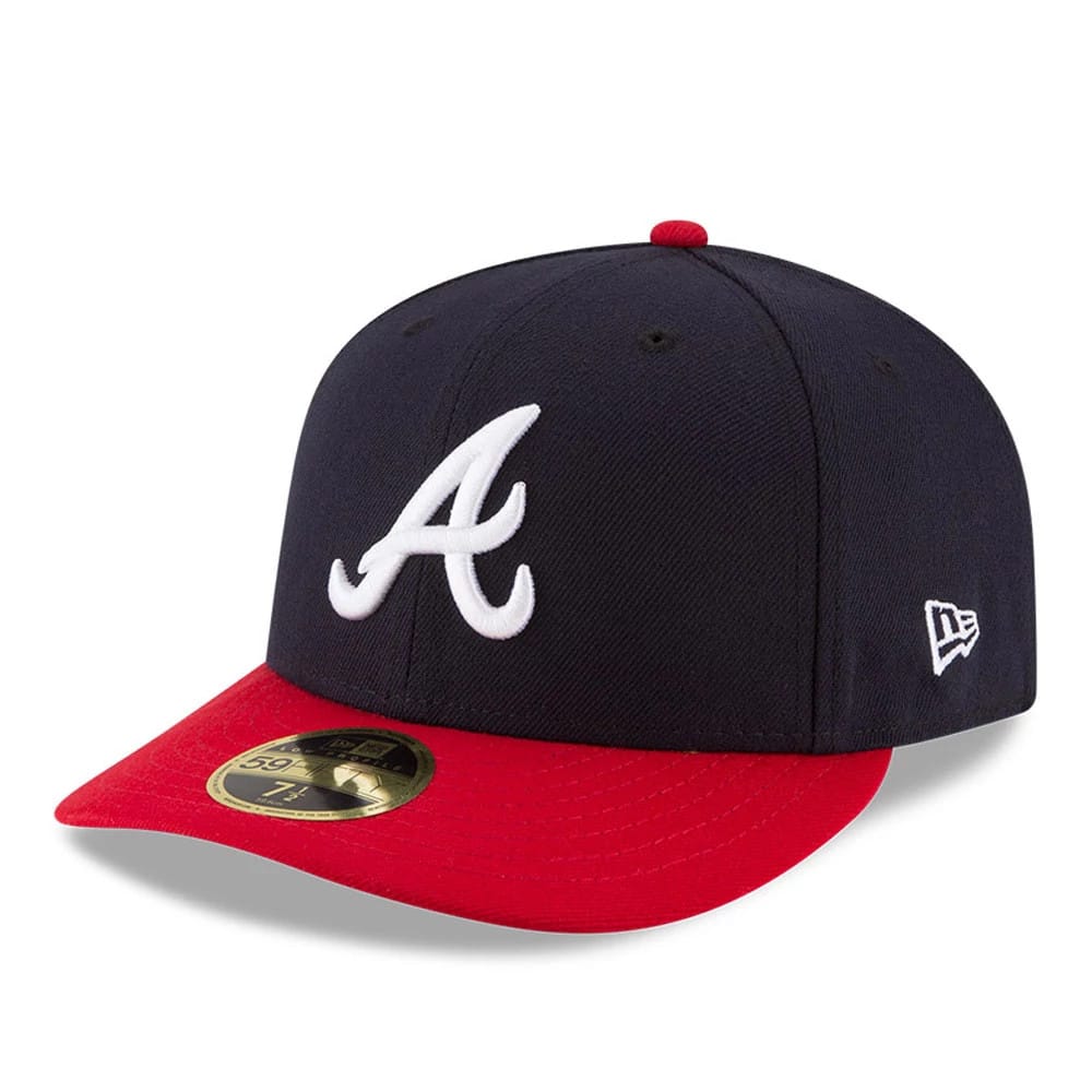 Atlanta Braves Authentic Collection Low Profile New Era 59FIFTY, three-quarter view showing a raised white A embroidered on the front panel, a red curved visor with a gold 59FIFTY size sticker, and the New Era flag logo on the left side.