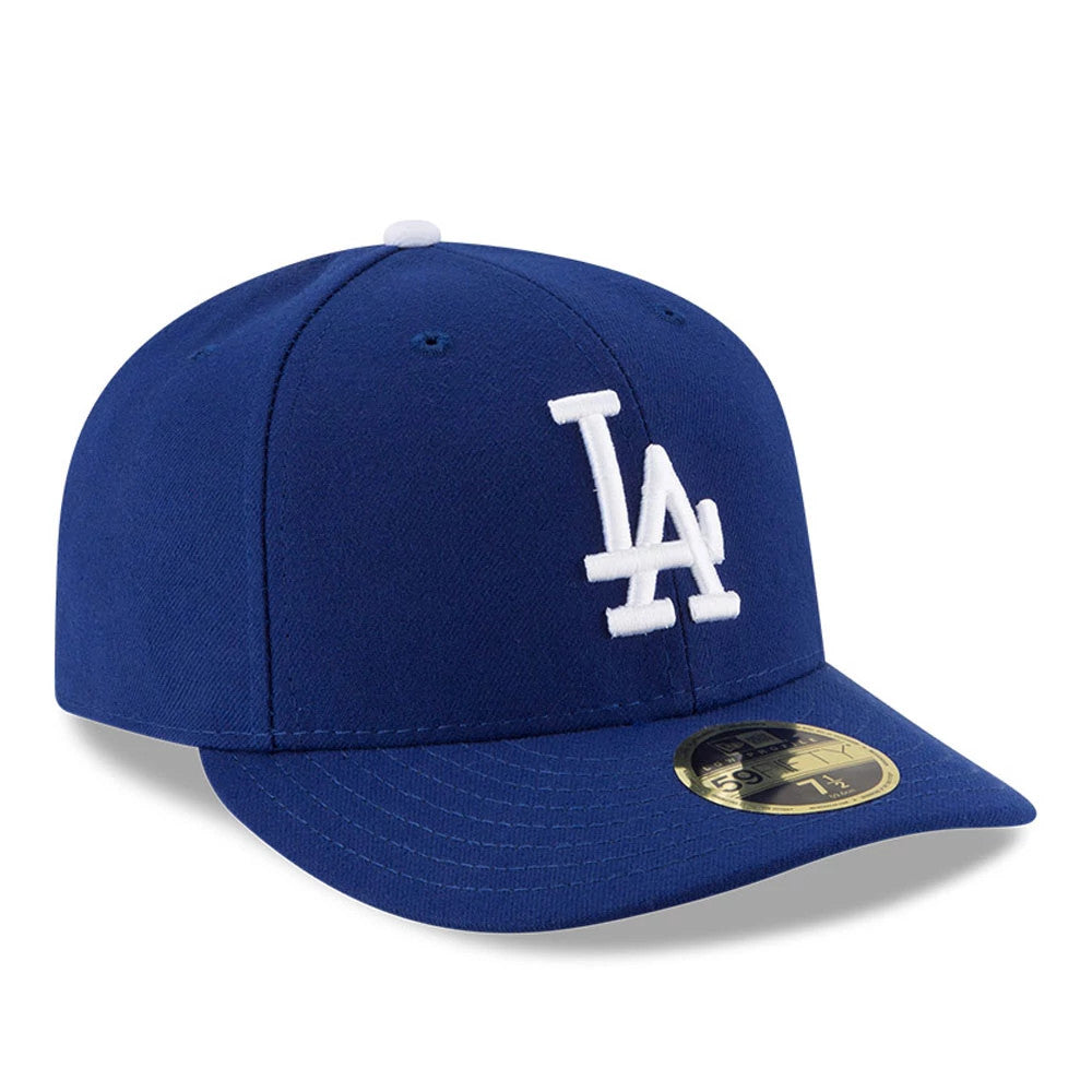 LA Dodgers Authentic Collection New Era 59FIFTY Low Profile Cap, three-quarter view showing the raised white LA logo embroidered on the structured blue crown, a matching blue visor, and a gold 59FIFTY size sticker on the visor.