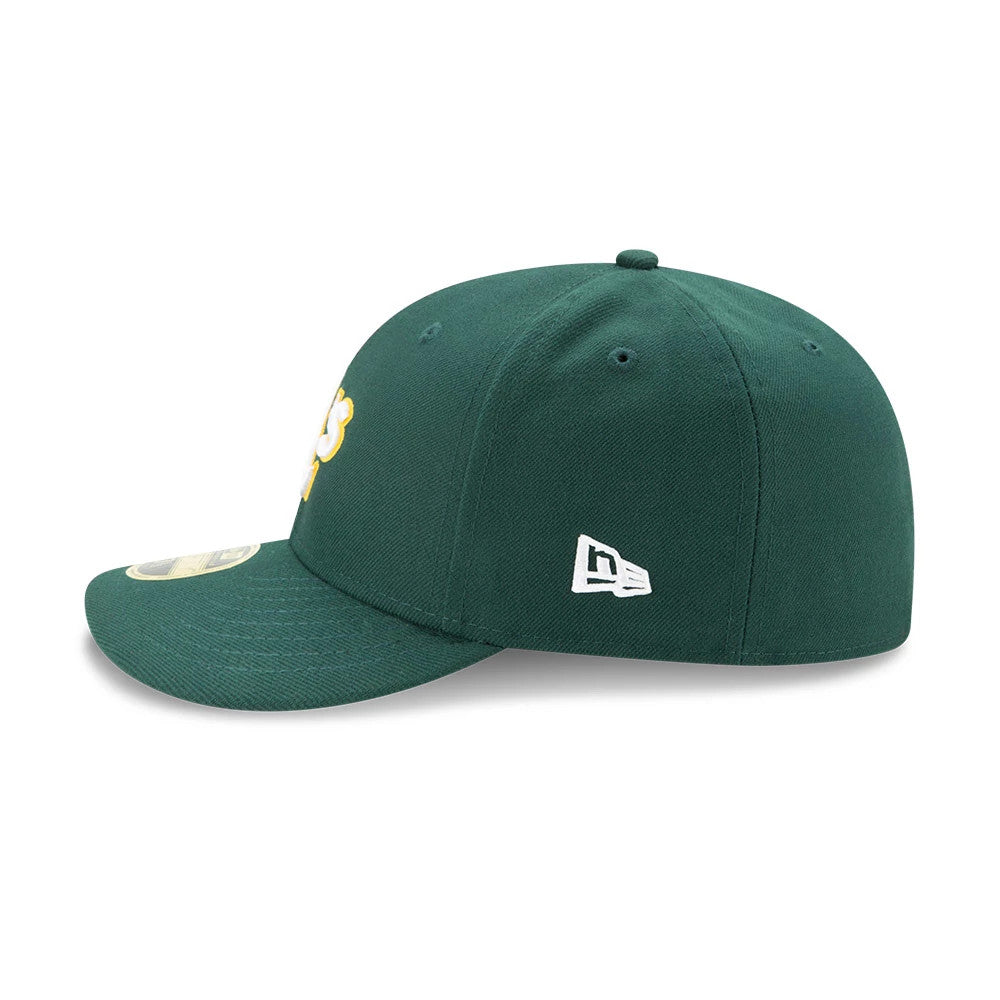 Athletics Authentic Collection Low Profile New Era 59FIFTY, side view showing the white New Era flag logo embroidered on the left side of the structured dark green crown, with a curved visor featuring a gold 59FIFTY size sticker.