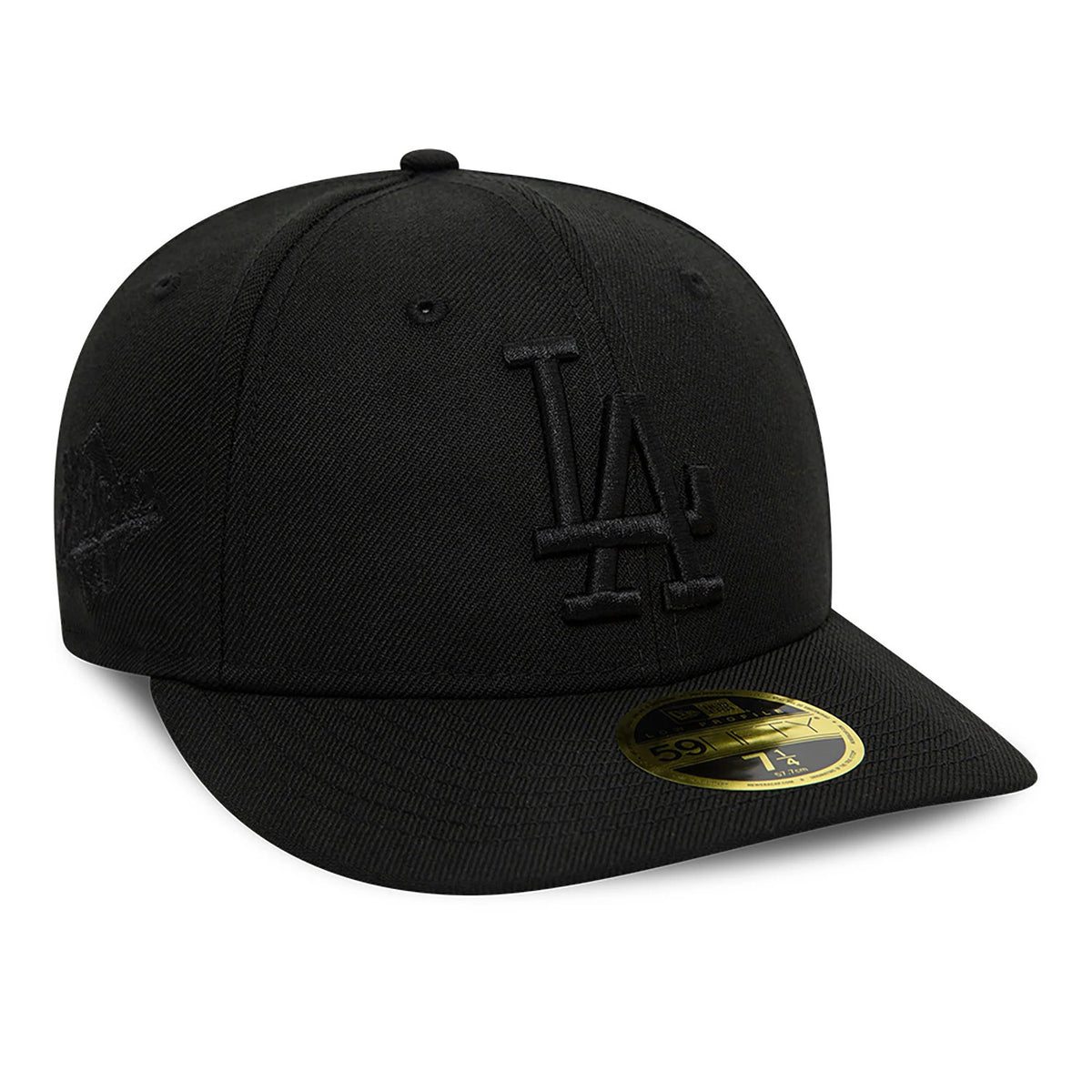 LA Dodgers MLB Black Low Profile New Era 59FIFTY Fitted Cap, three-quarter view showing the black raised embroidered LA logo on the front panel, black structured crown and curved visor, with a gold 59FIFTY size sticker on the visor.