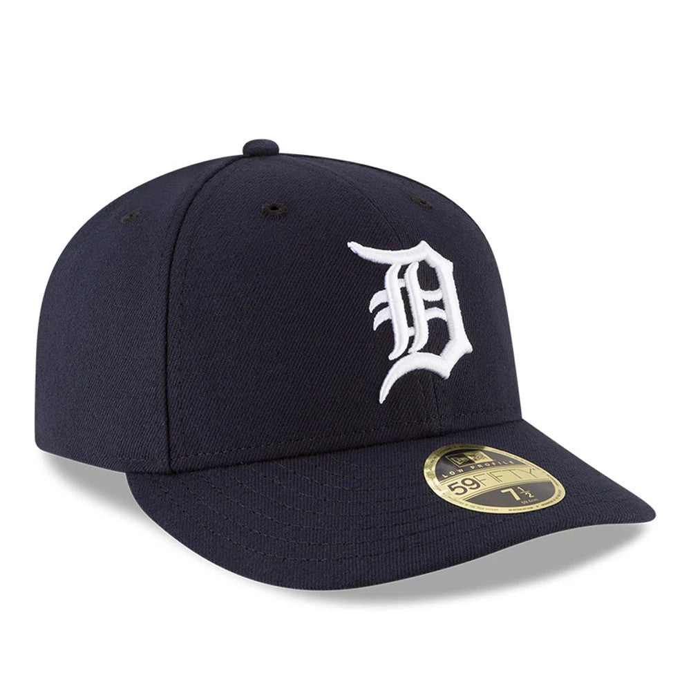 Detroit Tigers Authentic Collection Low Profile New Era 59FIFTY, three-quarter view showing a white embroidered Old English D logo on the front panel, a curved navy visor, and a gold 59FIFTY size sticker on the visor.